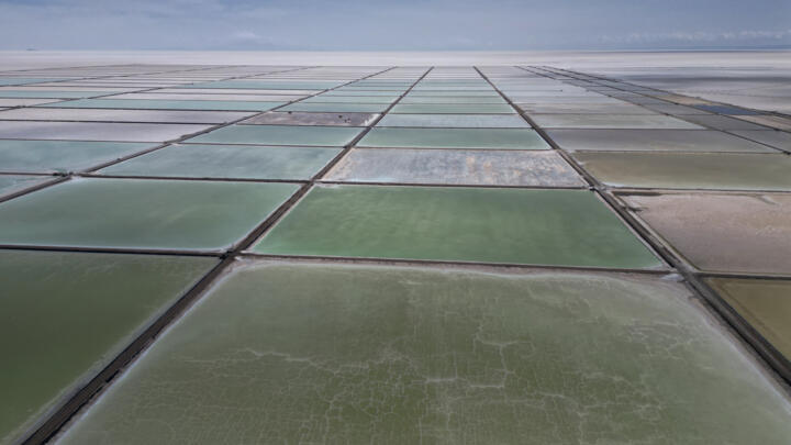 Salt recovery pools in different degrees of evaporation are visible at an industrial plant producing lithium carbonate on the outskirts of Llipi, Bolivia on December 15, 2023.