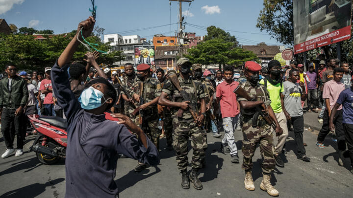 Members of the Madagascan military walk in the streets of Antananarivo on October 11, 2025.