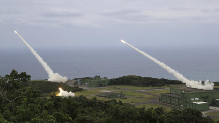 Practice rounds are launched from HIMARS rocket launchers during a testing drill in Pingtung County, Southern Taiwan, in May 2025.