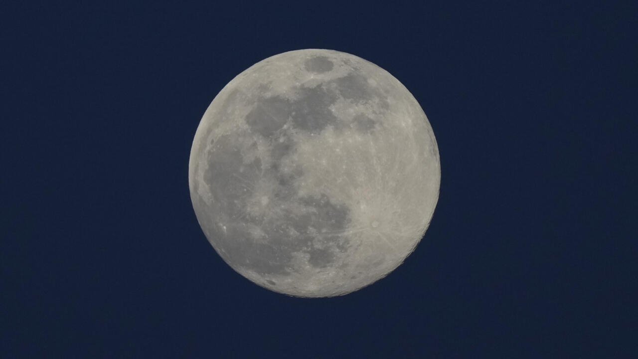 A supermoon is seen in the sky above Yangon, Myanmar on December 4, 2025.