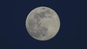 A supermoon is seen in the sky above Yangon, Myanmar on December 4, 2025.
