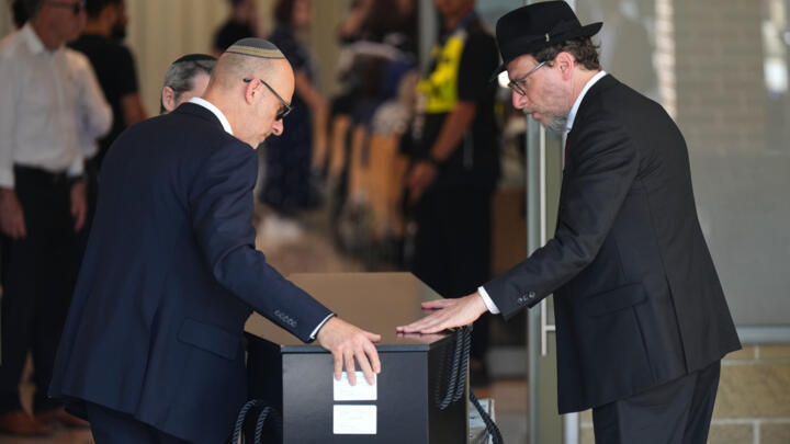 The coffin of Rabbi Yaakov Levitan, a victim in the Bondi Beach mass shooting, is carried into a chapel for his funeral in Sydney, on December 17, 2025