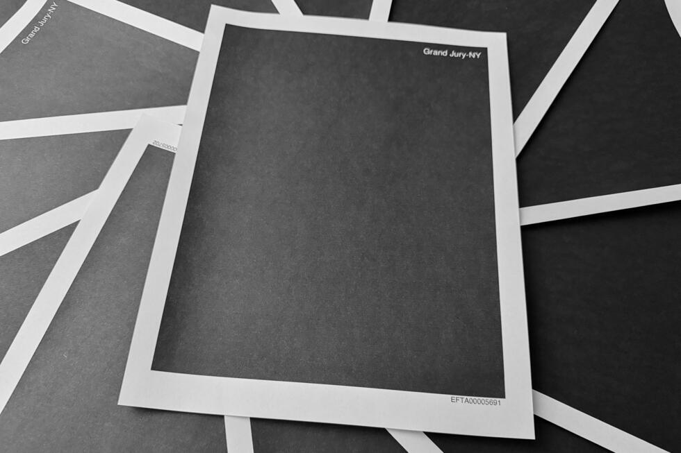 Pages from a totally redacted New York grand jury file into Jeffrey Epstein and Ghislaine Maxwell, released by the US Justice Department.